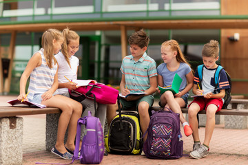 Canvas Print - group of happy elementary school students outdoors