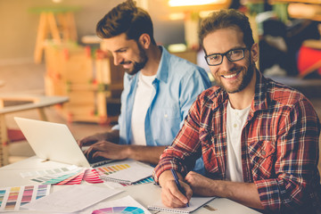 Canvas Print - Handsome designers working