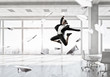 © Sergey Nivens - Dancing businesswoman in office . Mixed media