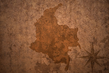 Wall Mural - colombia map on a old vintage crack paper background