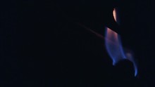 A close up shot of a lit pilot light on a furnace. HD 1080p.