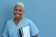 Black nurse isolated on blue