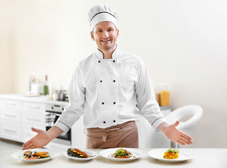 Young chef cook with different dishes in kitchen