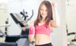 © Happy monkey - little girl with dumbbells  in fitness hall