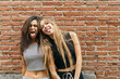 © Kike Arnaiz/ADDICTIVE STOCK - Two young crazy girls having fun
