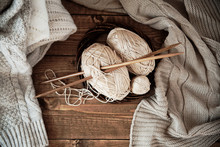 Ball Of Yarn And Knitting At Home
