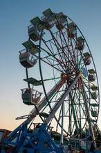 Ferris Wheel, A Ride At The County Fair In The Evening
