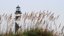 Loop Features The Cape Lookout Lighthouse, With Its Black And White Diamonds, Shining With Blowing Sea Oats In The Foreground. 