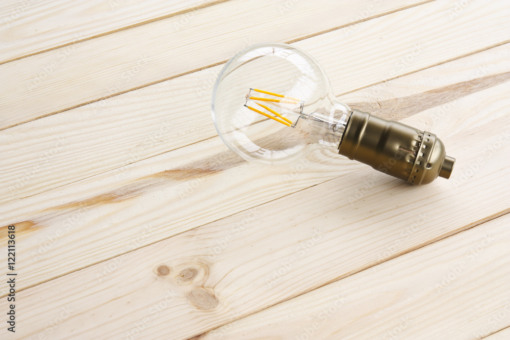 Lamp on top view wood table with space for business idea and vis