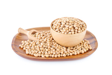 soybean in wooden bowl and plate on white background