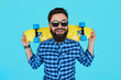 © kegfire - Young hipster man with a skateboard