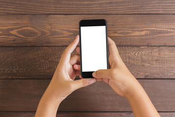 Poster - phone in woman hand showing white screen on wood table