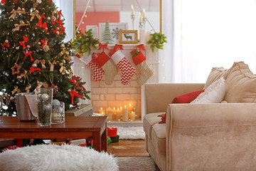 Wall Mural - Cozy Christmas interior of living room with beautiful fir tree