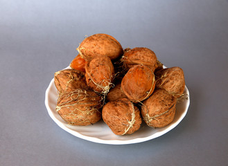  walnuts on a gray or white background