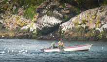 Small Boat Fisherman Bring In Crab Pots