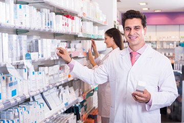 Wall Mural - pharmacists posing in drugstore