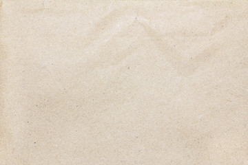 Recycled crumpled brown paper texture or paper background for design with copy space for text or image.