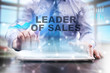 © WrightStudio - Businessman is using tablet computer, pressing button on touch screen and selecting 'Leader of sales'.