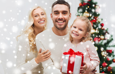 Poster - happy family at home with christmas gift box