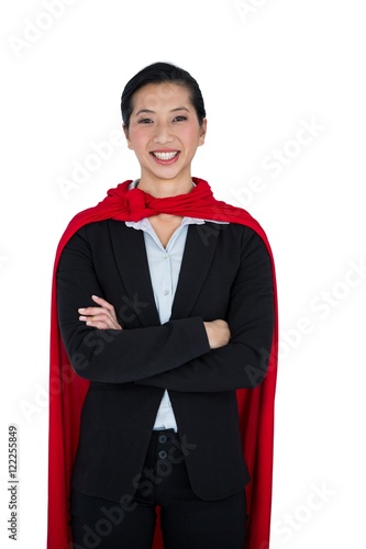 Fotografie, Obraz Woman pretending to be a super hero on white background
