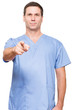 © Eric Hood - Doctor nurse surgeon pointing at camera on white