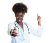 African american female doctor with curly hair pointing up and s