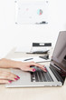 © nikodash - Woman hand typing on laptop keyboard