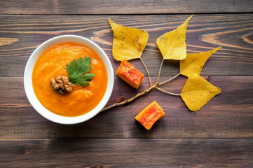Wall Mural - Vegan vegetable soup puree. Pumpkin, carrot, garlic and onion.
