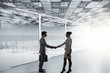 © Sergey Nivens - Business partners handshake . Mixed media