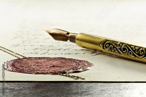 Fototapeta na wymiar antique notarial wax seal on old document