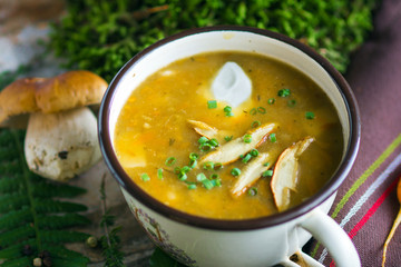 Poster - Creamy Mushroom Soup on old wooden background