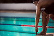 © torwaiphoto - swimmer swimming competition pool.starting block in a swimming p