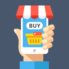 Wall Mural - hand holding smartphone with shopping basket and buy button on screen and decorative awning. ecommer