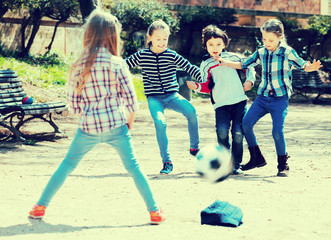 Wall Mural - Kids playing street football