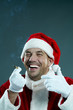 © pressmaster - Portrait of laughing Santa Claus smoking a cigarette