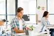 © Sergey Nivens - Young man working in office