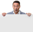 © spaxiax - surprised man holding a blank sheet