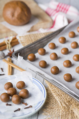 Wall Mural - Baking homemade pepernoten for Dutch holiday Sinterklaas