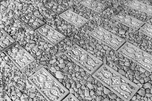 Walkway surface made of gravel grainy , stone and bricks for bac Poster