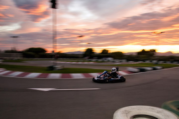 Go-Kart track. Sunset. Motion blur