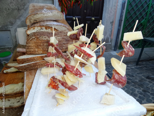 Fotografie, Obraz Skewers with cheese, salami and Altamura bread typical from Puglia, Italy