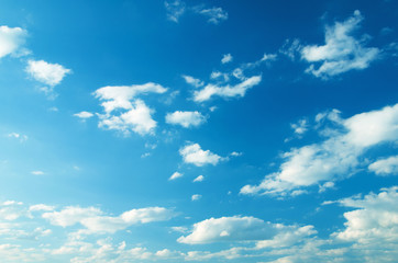 white fluffy clouds in the blue sky