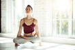 © zinkevych - Attractive slender woman practicing yoga