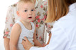 © rogerphoto - Doctor examining a child  patient by stethoscope