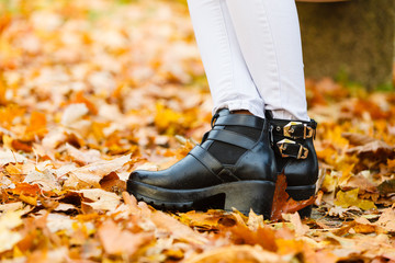 Young lady standing outdoor.