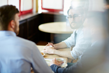 Canvas Print - Businessmen at cafe