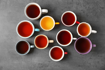 Sticker - Cups of tea on table, top view