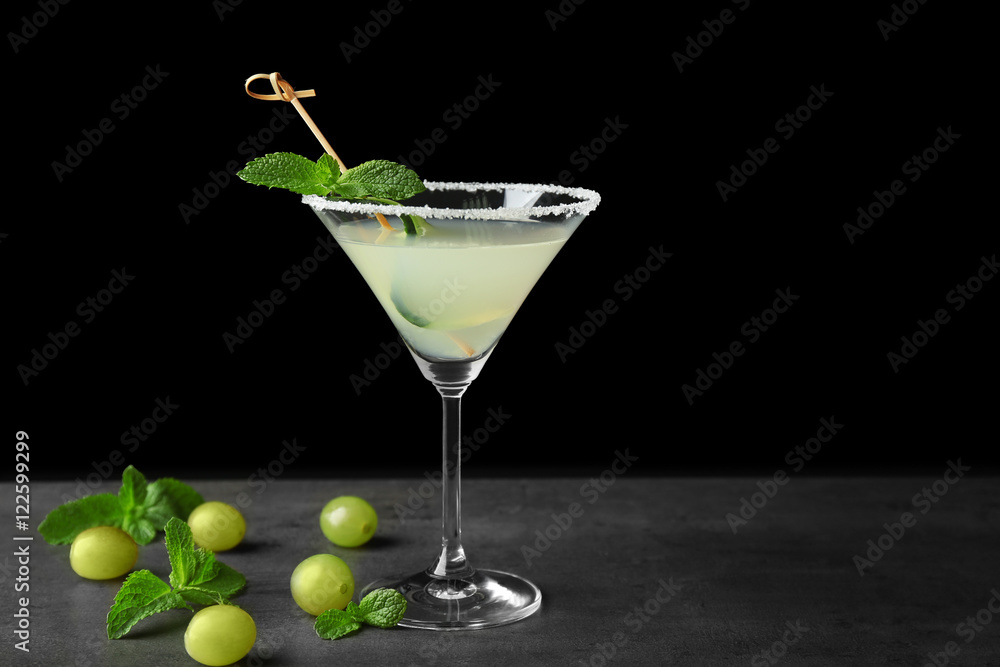 Delicious cocktail on gray table