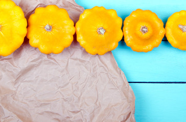 Wall Mural - Pumpkins on a table. Top view