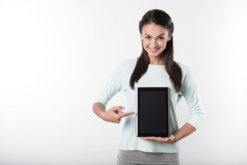 Sticker - Cheerful delighted woman holding tablet